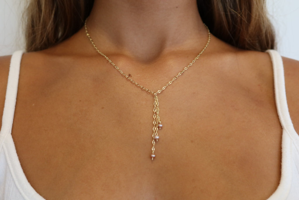 Falling pink pearls in gold filled