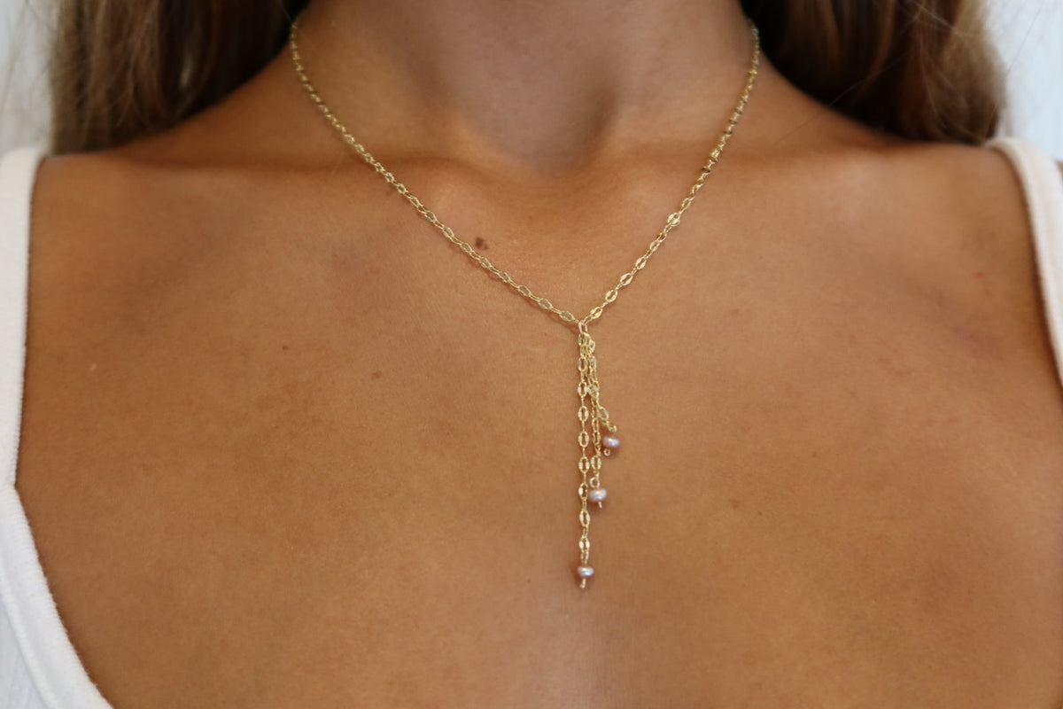 Falling pink pearls in gold filled